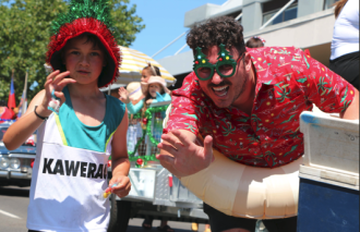 Lachlan McMillian and Councillor Justin Ross, at the Kawerau New World Santa Parade 2024