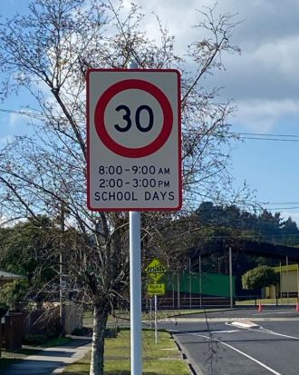 Close-up of new speed limit sign Onslow Street before Tarawera High School